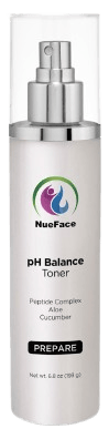 A bottle of NueFace pH Balance Toner with a spray nozzle. The label mentions Peptide Complex and Cucumber, and it is part of the "PREPARE" line.