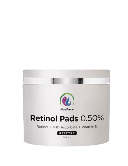 A white jar labeled "Retinol Pads 0.50%" with additional ingredients listed as THD Ascorbate and Vitamin E. The jar has a simple design and a reflective silver lid.